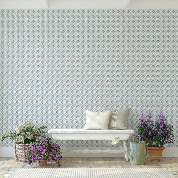Blue damask wallpaper with diamond-set medallions and floral scrollwork, offering a timeless pattern for traditional bedrooms or entryways. The removable, high-quality design adds a relaxed vintage touch to any space.