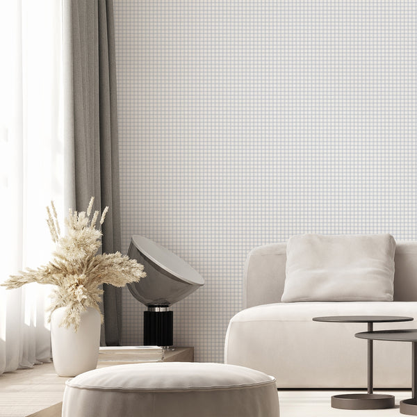 Muted blue trellis wallpaper with a repeating geometric pattern and soft gray textured background for modern and neutral home interiors.