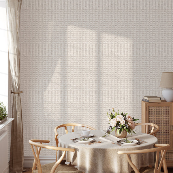 Tiny diamond and square motifs in taupe on an off-white, plaster-like surface, creating a subtle geometric pattern. This traditional unpasted wallpaper is perfect for Japandi-inspired hallways.