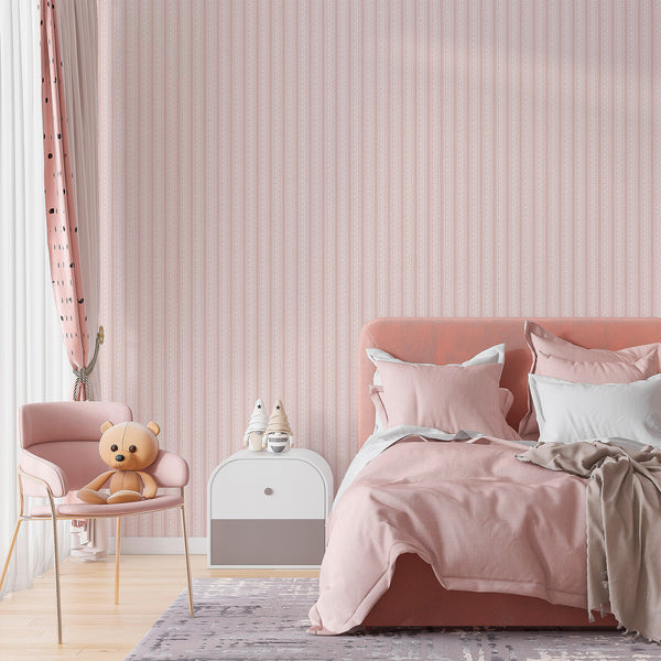 Pink botanical wallpaper featuring repeating white floral columns, decorative rose stripes, and a subtle textured finish for cottagecore interiors.
