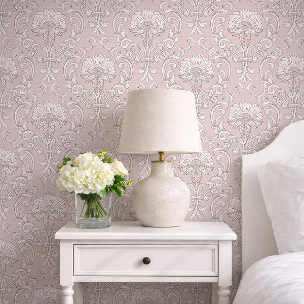 Generous-scale blush pink damask pattern with soft shading, creating warmth in a living room. Removable and easy to reposition, perfect for decorators.