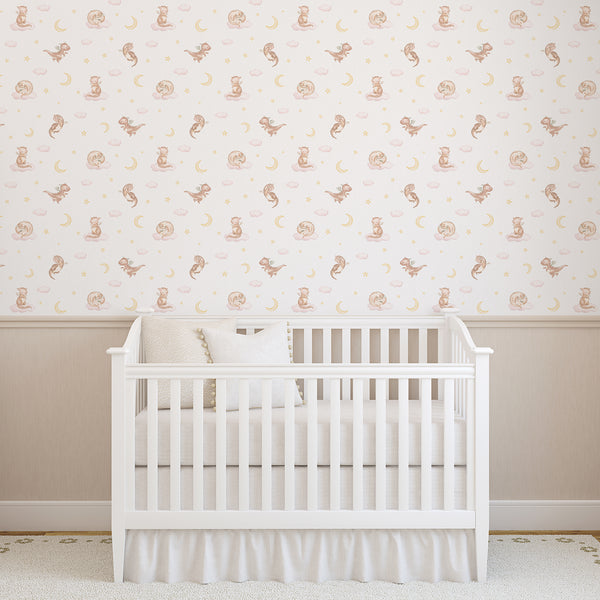 Cute dragon wall mural featuring a watercolor baby dragon with wings on a pink cloud, surrounded by yellow stars for a fairytale kids bedroom.