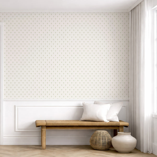 Neutral botanical wallpaper featuring soft sage green stylized leaves and delicate dotted stems on an off-white background for Scandinavian-style interiors.