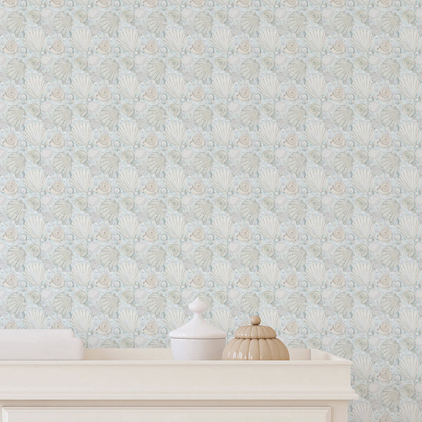 Coastal bathroom wallpaper with elegant watercolor shell illustrations, pale blue ocean colors, ivory shells, and subtle seaside textures.