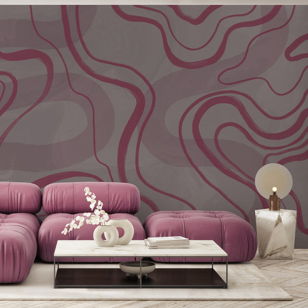 Modern abstract wallpaper with sweeping pink curves and layered gray textured shades, perfect for contemporary living room or bedroom decor.