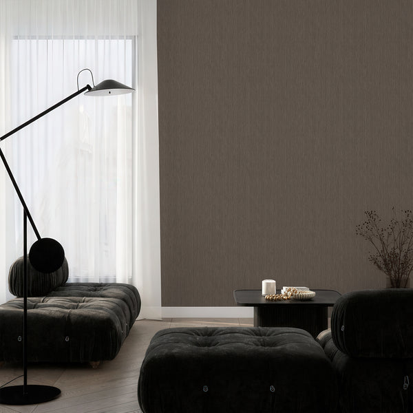 Textile-like taupe wallpaper with vertical emphasis, perfect for adding calm movement to a contemporary home office. The self-adhesive, removable design allows for easy application, making it suitable for designers looking for a temporary yet elegant solution.