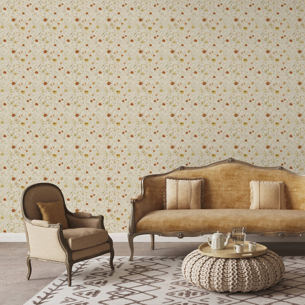 Neutral beige botanical wallpaper with watercolor meadow flowers in terracotta, yellow and soft green, ideal for a cozy cottagecore bedroom accent wall.