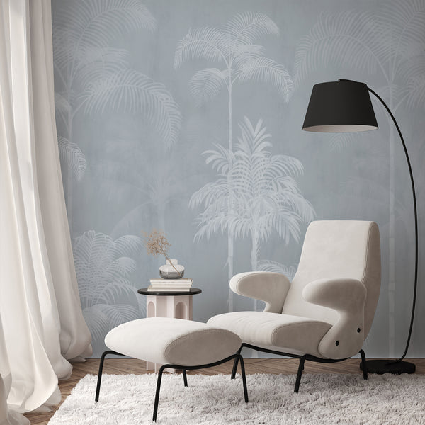 Neutral blue palm tree wall mural featuring tall tropical trees and delicate white foliage for a serene bedroom or living room accent wall.