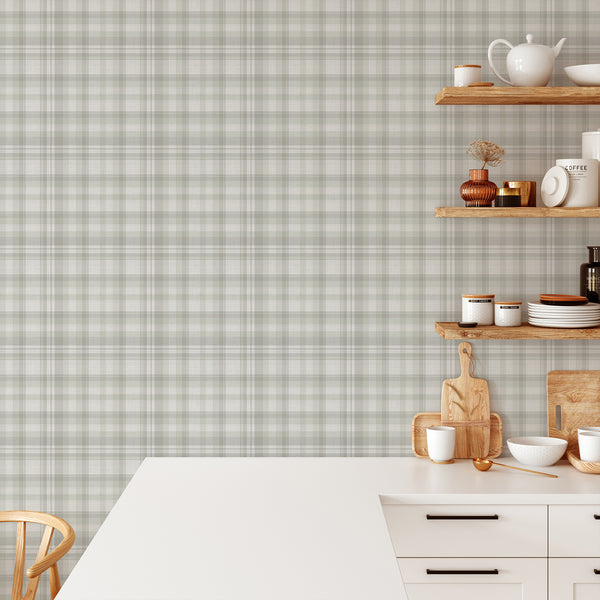Vintage light sage green plaid wallpaper with overlapping horizontal and vertical stripes in delicate neutral shades, ideal for English country and farmhouse home decor.