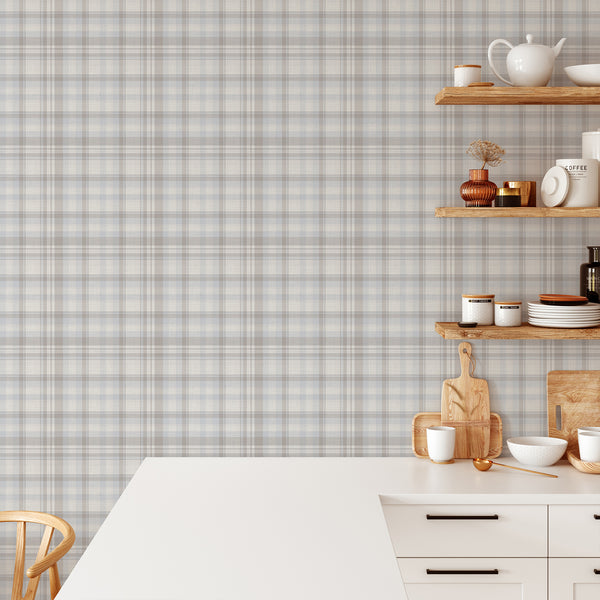 Light blue peel and stick wallpaper featuring a soft plaid pattern with beige and taupe accents, suitable for neutral bedrooms and cozy cottage interiors.