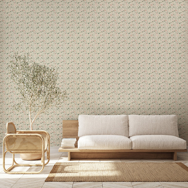 Botanical wallpaper featuring sage green leaves and stems with blush pink flowers on a warm cream background for a cottagecore bedroom or nursery.