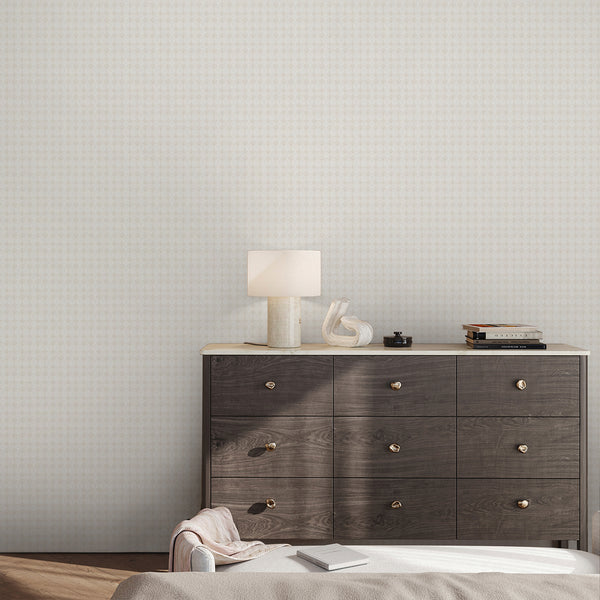 Light beige and off white damask wallpaper with faded floral ornaments and a soft vintage texture, ideal for a bedroom or elegant neutral living room.