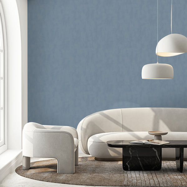 Close-up of plaster look wallpaper with subtle tonal mottling, ideal for adding depth to Scandinavian-style interiors.