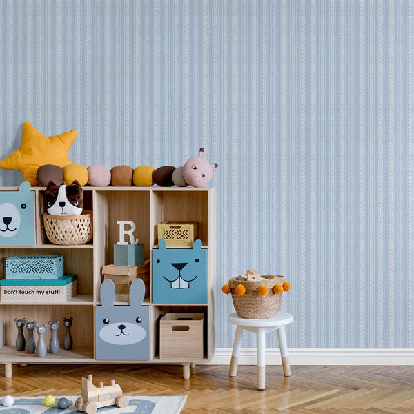 Delicate botanical stripe wallpaper in soft blue and white offers a classic vintage aesthetic for nursery decor, bedroom accent walls, bathroom walls, and cozy cottage homes.