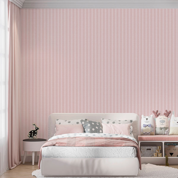 Pink botanical wallpaper featuring repeating floral columns, decorative wavy stripes, and a pale blush textured background for cottagecore interiors.