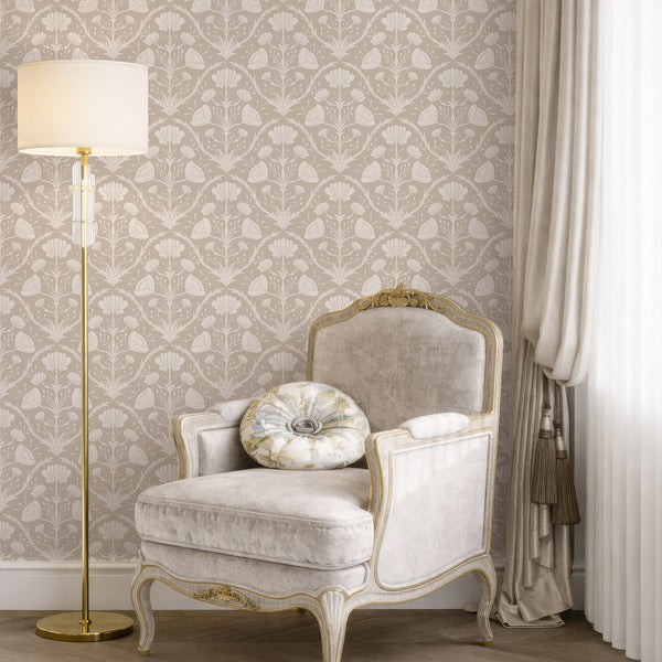 Beige floral wallpaper with stylized blooms and acanthus motifs, ideal for adding warm patterns to living rooms. The two-tone design and darker linework complement cottagecore and French country styles beautifully.