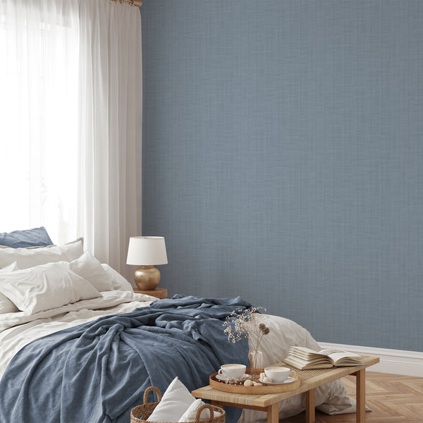 Elegant dusty blue linen texture wallpaper, perfect for creating a serene atmosphere in coastal or Scandinavian interiors. The subtle plaid-like weave adds sophistication to home offices or living rooms, with removable and traditional unpasted options available.
