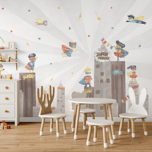 Comic city wallpaper featuring watercolor superhero children, skyscrapers, colorful stars, lightning bolts, and playful action words for a kids room.