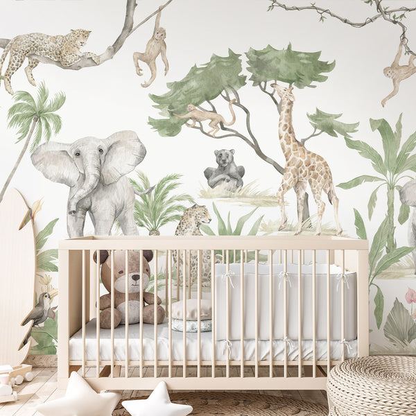 Close-up of Safari wall mural showcasing soft watercolor animals like monkeys and parrots interwoven with branches and palms on a pale background. The gentle pencil outlines and muted colors evoke a Scandinavian style, perfect for creating a calm and storybook atmosphere in a family room. Made in the USA, ideal for renters.