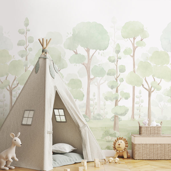 Soft green forest landscape wallpaper featuring layered watercolor trees, pale beige trunks, and misty woodland details for a nature-inspired nursery.