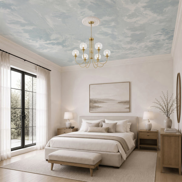 Dreamy light blue cloud wallpaper with soft white clouds and subtle neutral tones, ideal for a serene nursery, bedroom, or kids room accent wall.