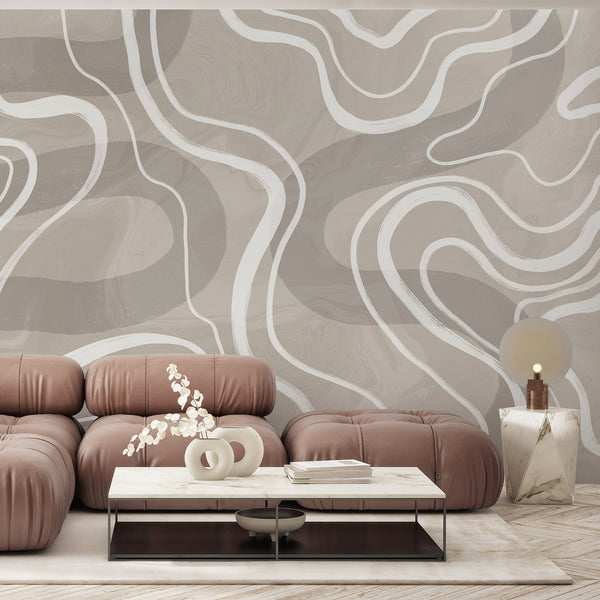 Neutral abstract wallpaper with sweeping white curves over a warm beige textured background, ideal for an organic modern bedroom.