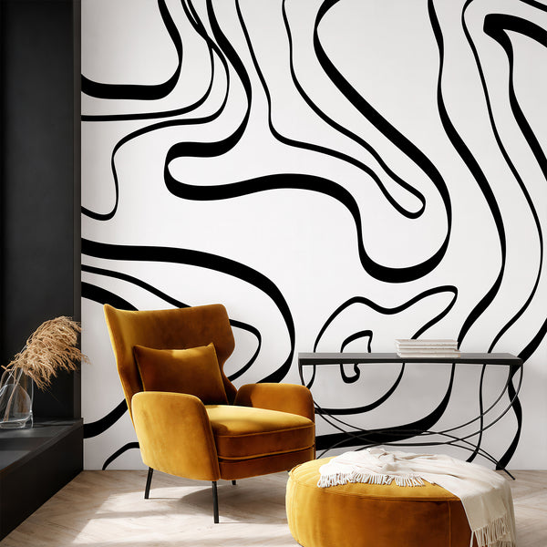 Minimalist abstract wallpaper featuring bold black curved lines and freeform shapes on white for a modern bedroom or living room interior.