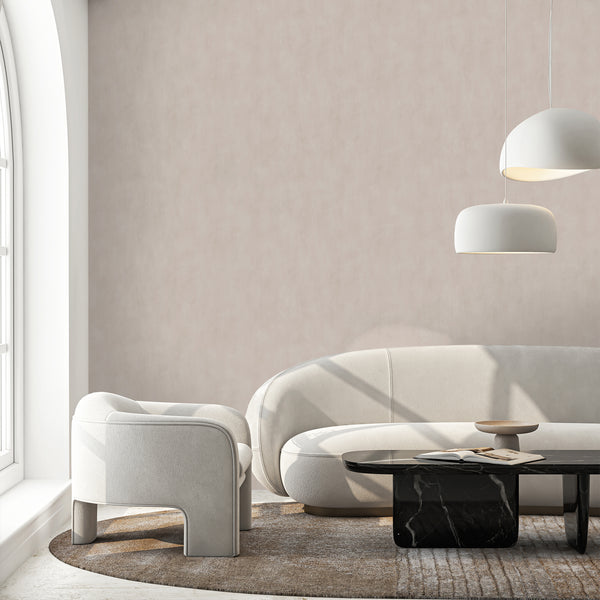 Plaster look wallpaper in beige, featuring subtle cloud-like tonality, ideal for bedrooms seeking a neutral foundation. The velvety matte finish and painterly texture enhance modern and Japandi decor styles.