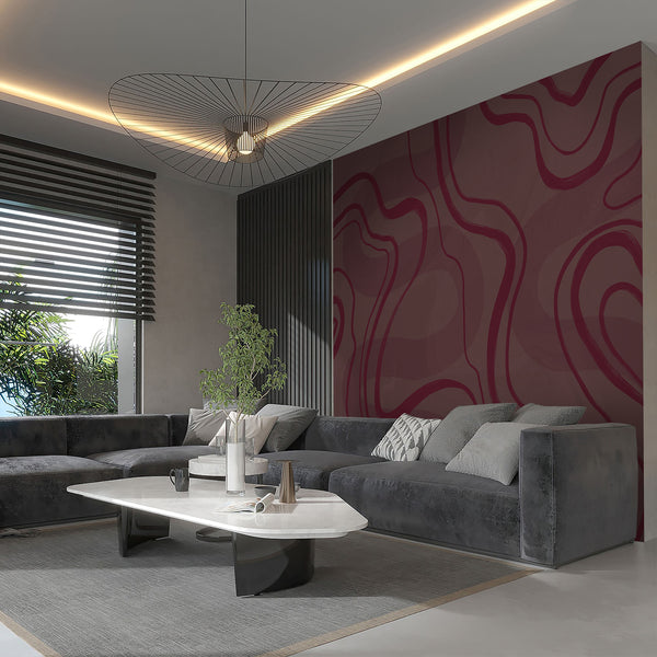 Modern burgundy wall mural with sweeping dark red curves over a muted mauve textured background, ideal for a stylish living room accent wall.
