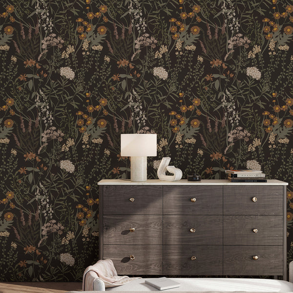 Sophisticated Moody Dark Floral Wallpaper featuring delicate wildflower motifs on a dark base. The rich olive, rust, and beige accents create a vintage feel, perfect for accent walls in cottagecore living rooms or eclectic studies, offering removable options for renters.