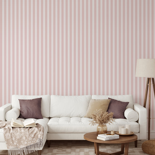 Minimalist pink wallpaper featuring a timeless vertical stripe pattern with slim white pinstripe accents for bedrooms, living rooms, or entryways.