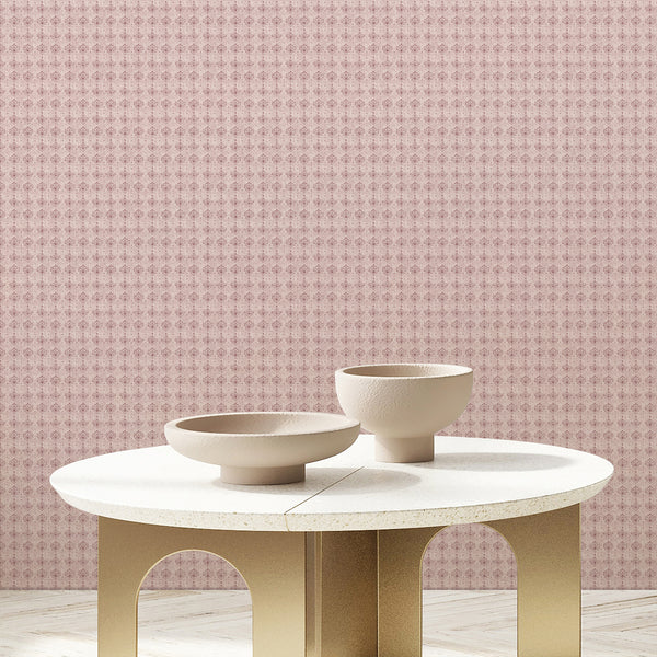 Pink vintage wallpaper with faded damask floral motifs and a distressed textured background, ideal for a bedroom, dressing room or powder room.