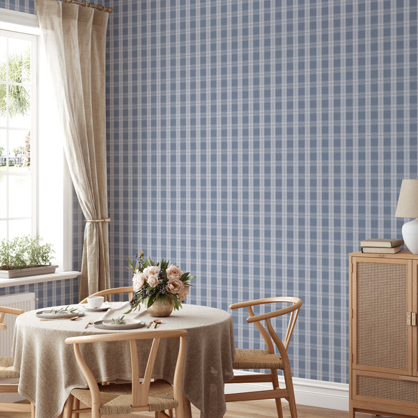 Blue plaid wall mural with pale checks and delicate stripe detailing, styled with rustic wood decor for a coastal or modern farmhouse interior.