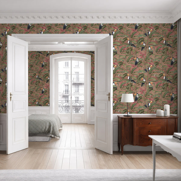 Vintage jungle wallpaper featuring detailed toucans, hummingbirds and lush olive green botanical leaves against a dusty rose terracotta backdrop.