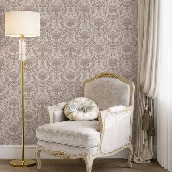 Floral damask wallpaper in beige with ornate medallions, ideal for living rooms seeking a vintage touch. The muted dusty rose and taupe tones pair well with traditional decor, providing a romantic and elegant backdrop.