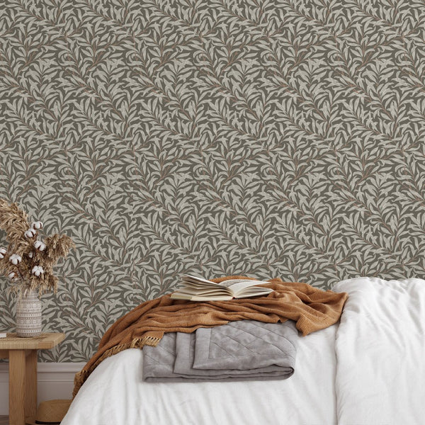 Dense willow bough pattern with elongated leaves creating a rhythmic lattice on a taupe-brown backdrop. Perfect for bedrooms, this eco-friendly, self-adhesive wallpaper is great for renters seeking a soothing decor update.