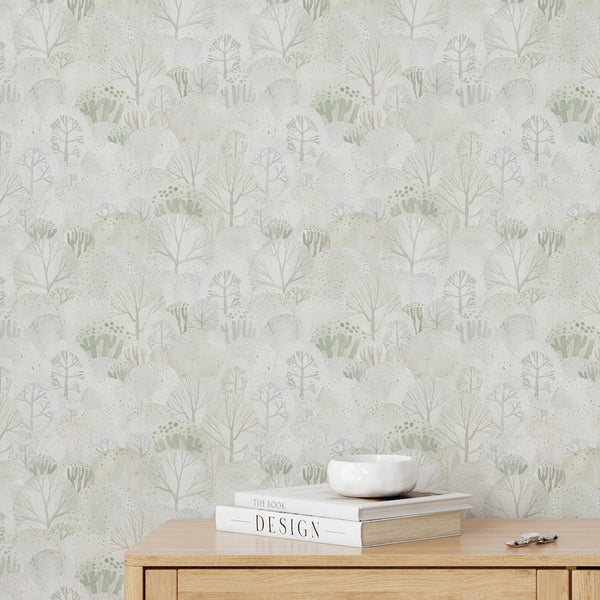 Botanical nature wallpaper with soft green tree silhouettes, delicate branches and dotted woodland foliage creating a peaceful forest-inspired pattern.