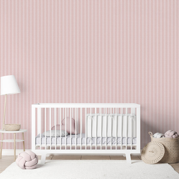 Cottagecore wallpaper in pale blush pink with dusty rose botanical vines and repeating vertical stripes for a charming nursery or girls bedroom.