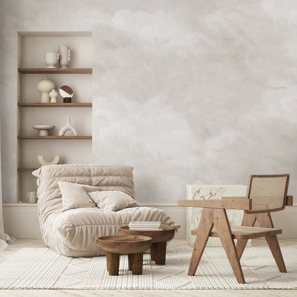 Neutral beige cloud wall mural featuring soft white clouds and a dreamy muted sky, creating an airy backdrop for a peaceful nursery or bedroom.