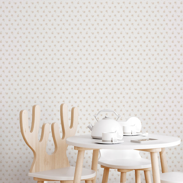 Minimalist flower wallpaper with warm beige floral sketches scattered over a white background, ideal for a bedroom, nursery or powder room.