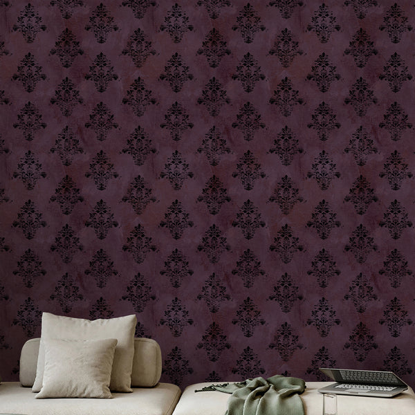 Gothic damask wallpaper in dark purple and black with faded floral ornaments and a weathered texture for Victorian and dark academia interiors.