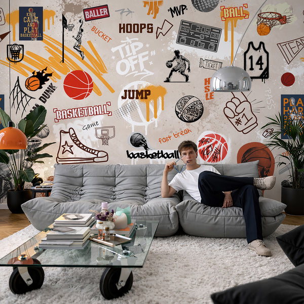 High-energy basketball graffiti mural with illustrated players and spray-paint textures, ideal for a modern home gym or playroom. The temporary wallpaper combines orange, black, and warm ochre accents with detailed sketches and halftone textures, bringing urban street-art flair to any space.