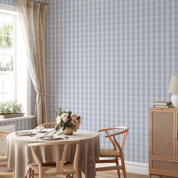 Coastal plaid wallpaper in dusty blue and white with refined intersecting lines, creating a fresh backdrop for bedrooms and living spaces.