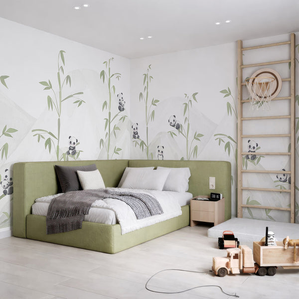Cute animal wall mural featuring baby pandas, delicate green bamboo and layered watercolor mountains in a soft neutral palette for a nursery.