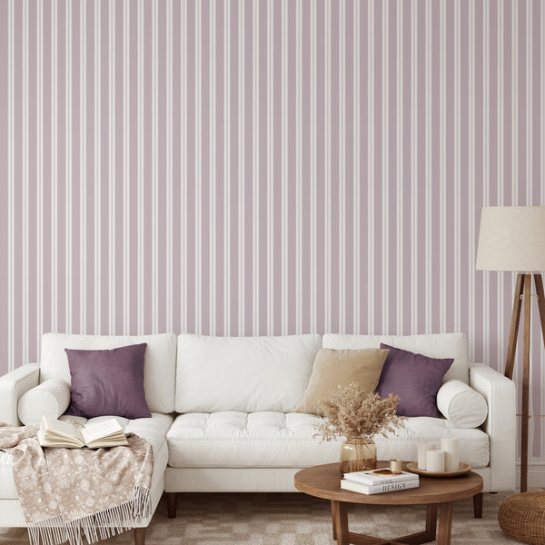 Soft mauve pinstripe wallpaper featuring crisp white vertical stripes and fine linear accents for a minimalist nursery or girls bedroom wall.