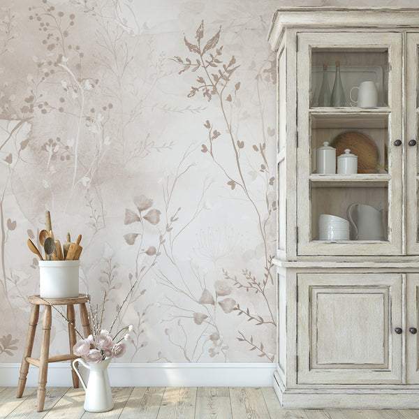 Soft beige wildflower wallpaper with layered botanical silhouettes and delicate stems, creating an elegant neutral design for bedroom or living room decor.