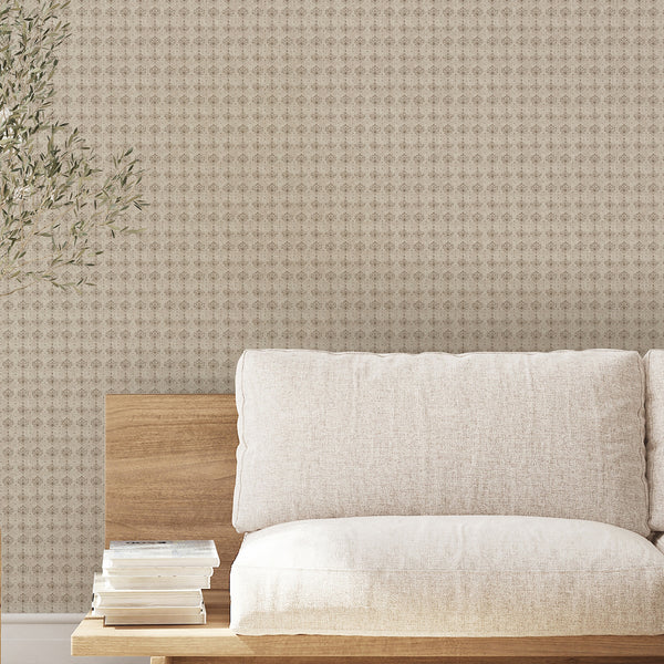Taupe and beige damask wallpaper with faded floral motifs and a weathered vintage finish, perfect for a farmhouse bedroom or neutral living room decor.