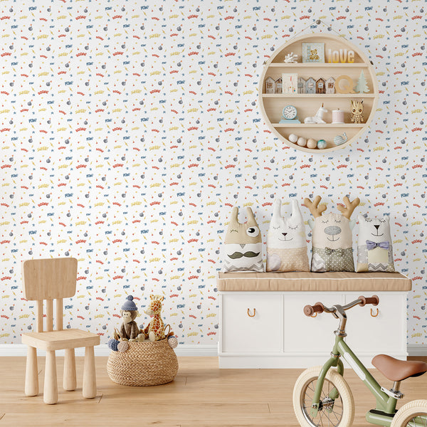Comic-inspired kids wallpaper with a hand-painted black bomb, red and yellow spark, and golden lightning bolt for a playful boys bedroom.