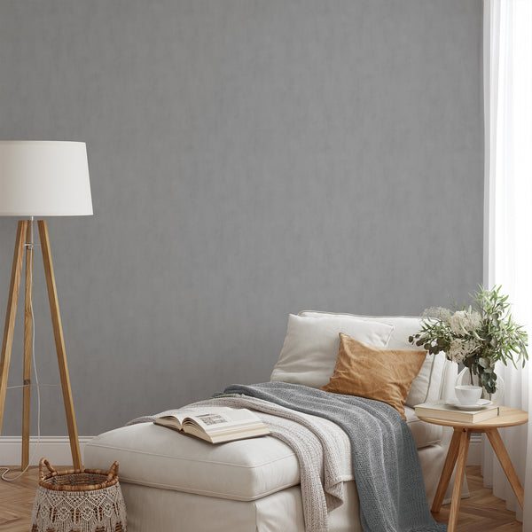 The Gray Plaster Look Wallpaper offers a smooth, neutral finish with a troweled plaster appearance. Ideal for modern interiors needing a solid backdrop, this removable wallpaper emphasizes eco-friendly construction and easy application for renters and designers.