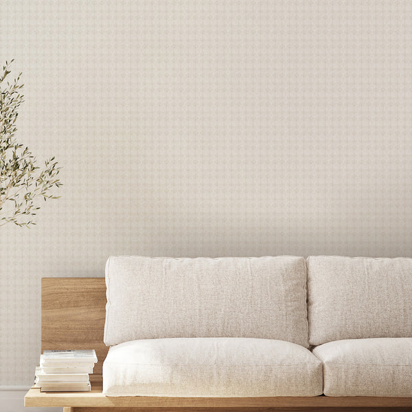 Beige peel and stick wallpaper with repeating vintage damask motifs and a subtle distressed finish for neutral farmhouse and French country interiors.